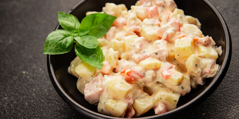 Potato salad ham, potato, tomato, carrot, mayonnaise tasty snack fresh delicious gourmet food background on the table rustic top view copy space