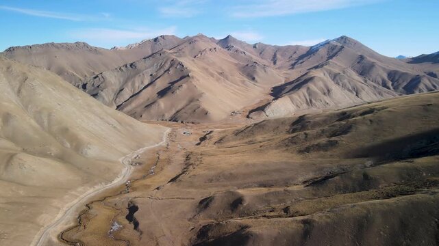Scenic mountain landscape around Tash Rabat caravanserai in the Tien Shan, Kyrgyzstan. The Tien Shan Mountains in the area of ​​the Tash-Rabat River at an altitude of over 3500 m