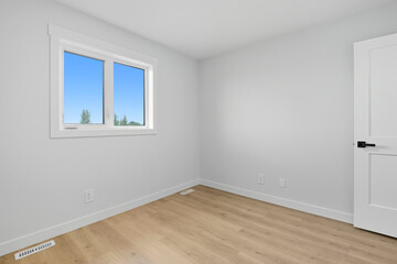Fototapeta premium Bedroom with a white door and a window