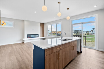 Kitchen with a white counter and blue cabinets