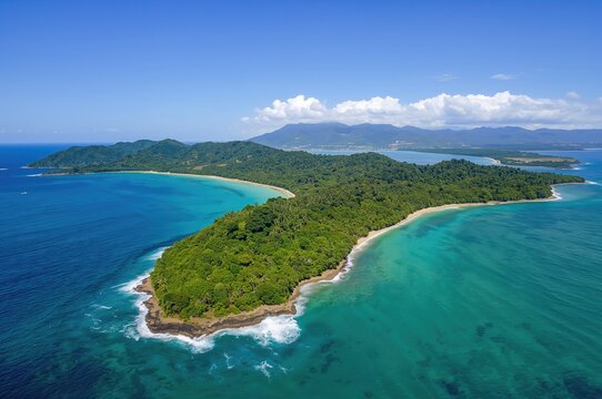Overhead perspective of a tropical shoreline on a peninsula coast.