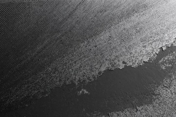 Obraz premium Graphite pencil sketch on gray canvas with dark white shading and silver highlights on textured craft paper, close-up macro view