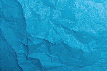Obraz premium Textured blue carbon paper with wrinkles