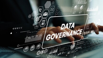 Business Professional Engaged in Data Governance with Digital Interface and Analytics Graphics...