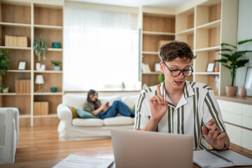 Man having video call working from home