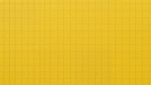 Energetic yellow workout mat with a joyful, square-patterned textured background