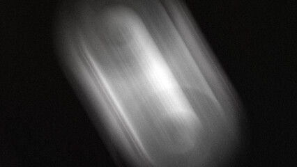 Striking abstract black and white background with dynamic light streaks