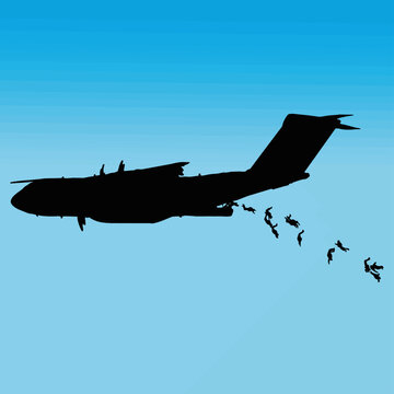 Lanzamiento de paracaidistas desde avi&oacute;n militar