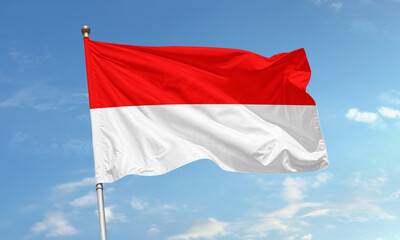 Indonesian national flag waving in clear sky