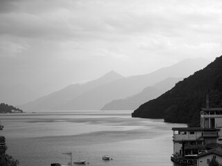 Scenic View of Stormy Lake Como with Mountains in Background