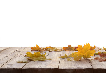 Autumn maple golden leaves on wooden table. Autumn Product podium isolated
