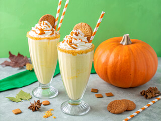 Creamy Pumpkin Spice Milkshake with Whipped Cream and Cookies