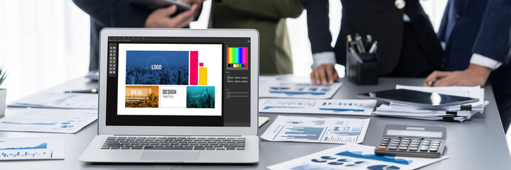 Graphic designer software for modern design of web page and commercial brisk ads showing on the...