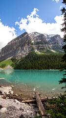 Turquoise lake nestled beneath a majestic mountain