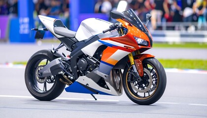 Sport motorcycle on a track.  Colorful, modern machine