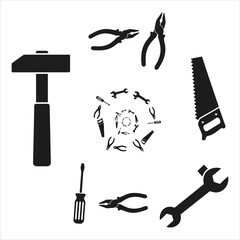 Fototapeta premium Assortment of Construction Tools Hammer, Saw, Wrench, Pliers, Screwdriver in Monochrome Silhouette
