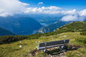 The elevated view on the Hallstatt Lake from tha panoramic observation deck Five Fingers with a bench