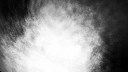 White fog or smoke on black background.	