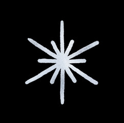 A snowflake painted by hand with silver metallic paint. A decorative snowflake made of silver foil..