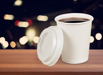 Cup of tasty hot coffee on the desk