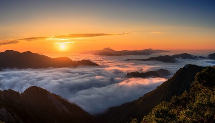 Fototapeta premium Sunrise Above The Clouds Mountain Range Panorama