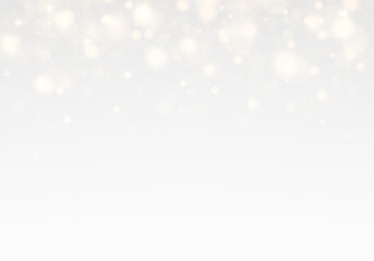 Golden stardust and glowing particles with radiant bokeh.