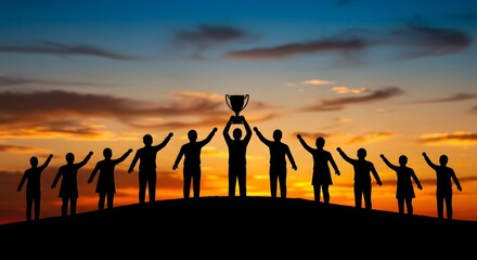 Silhouettes of Victorious Team Holding Trophy on Hilltop at Sunset