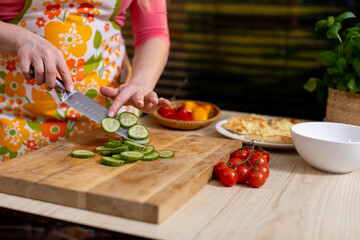 The careful prep of fresh, highquality ingredients in a cozy, inviting kitchen for all