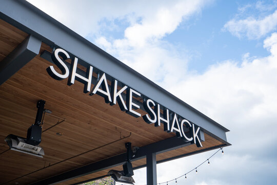 Tigard, OR, USA - May 3, 2025: The covered patio with heaters at a Shake Shack restaurant in Tigard, Oregon. Shake Shack is an American multinational fast casual restaurant chain based in New York.