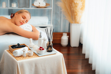 Caucasian woman customer enjoying relaxing anti-stress spa massage and pampering with beauty skin...