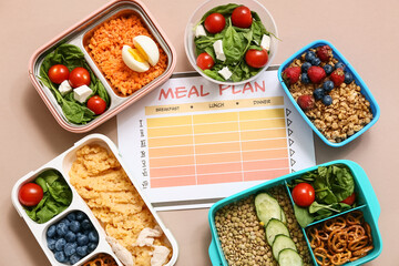 Healthy products and weekly meal plan on brown background. Diet concept
