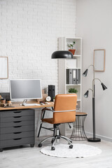 Comfortable workplace with computer in modern office