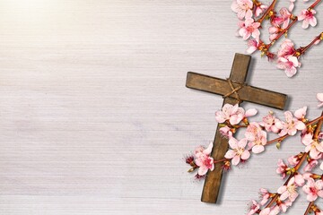 simple wood cross with border of colorful flowers