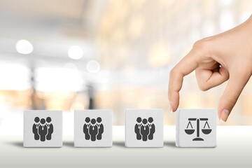 Employment laws and regulations on wooden cubes. Business ethics.