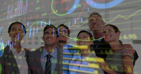 Team standing, watching financial overlay sweeping across group reacting with smiles as charts rise - Powered by Adobe