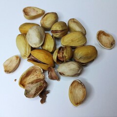 roasted pistachios on a white background 