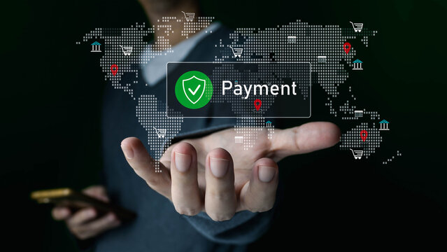A hand holds a device, displaying a secure payment interface with a world map overlay, symbolizing global transactions and e-commerce.