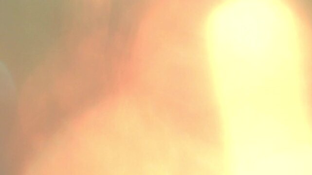 orange light leak lens flare burn film damage.