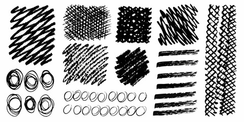 Collection of hand drawn black ink scribbles brush strokes and textures on white background © Rahul