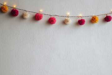 Modern plain wall decorated with a small Deepavali garland in a clean minimalist style.