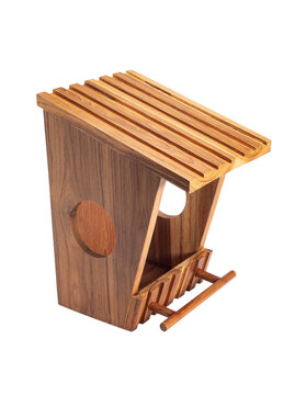 Handicraft birdhouse made from teakwood, It's has a roost at front isolated on white with clipping path