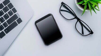 Modern Workspace with Smartphone, Glasses, and Potted Plant Accents