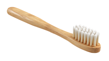 Wooden toothbrush with white bristles isolated on transparent background