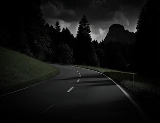 Winding road through dark forest under a stormy sky