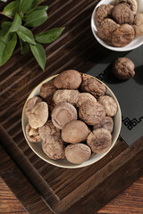 Fresh Shiitake Mushrooms in Bowl on Wooden Board - Healthy Cooking Ingredients