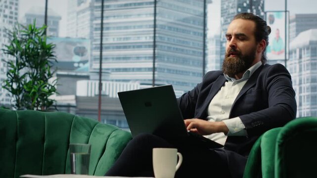 Hopeless male CEO sighing in dissatisfaction due to business crisis, worrying about downfall of the enterprise and failure. Tensed director dealing with a complicated ineffective activity. Camera B.