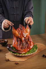 Traditional Chinese Chef Presenting Delicious Roasted Duck with Spicy Glaze and Soy Sauce