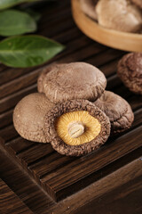 Fresh Shiitake Mushrooms on Wooden Board - Culinary Ingredients for Cooking and Food Preparation