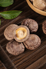 Fresh Shiitake Mushrooms on Bamboo Mat - Premium Asian Cooking Ingredients with Natural Texture