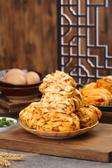 Homemade Scallion Meat Rolls - Traditional Layered Pastry Buns on Rustic Wooden Board